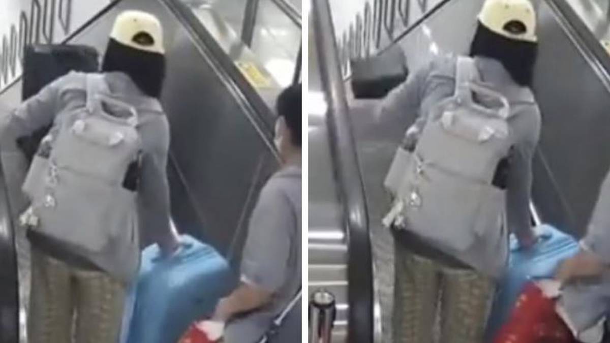 Kobieta upadła na ziemię, gdy walizka spadła na schody ruchome w Chinach